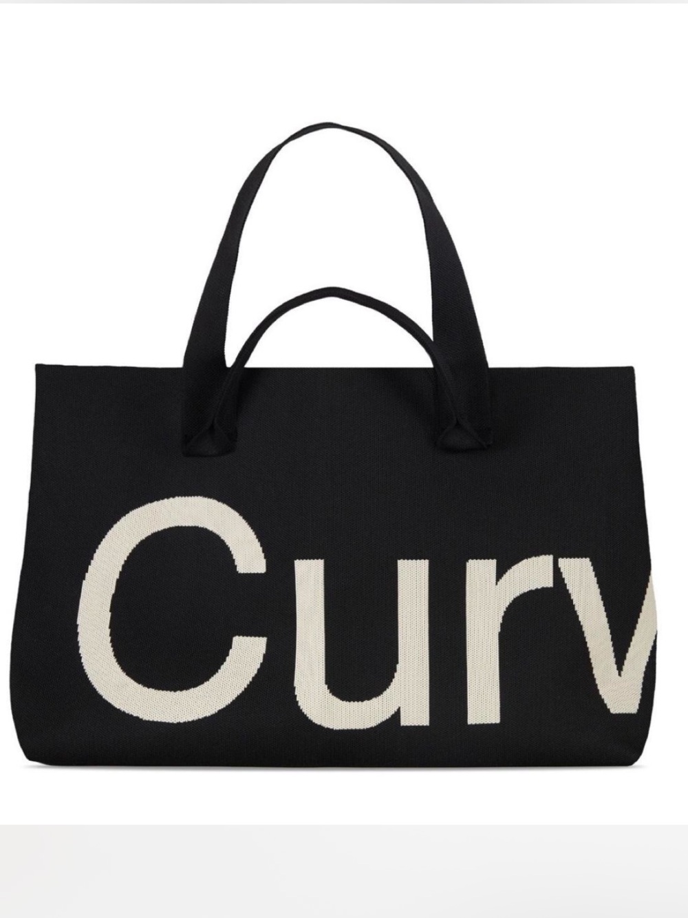 Curves knit tote (Black) by Sean Brown. 100% Authentic in original packaging.